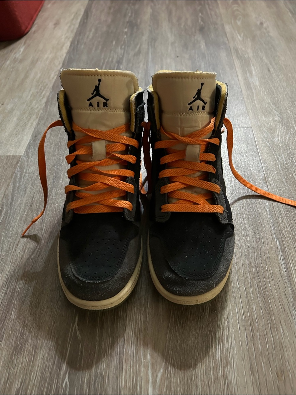 Nike Air Jordan High-Top Sneakers in Black, Cream & Orange Laces